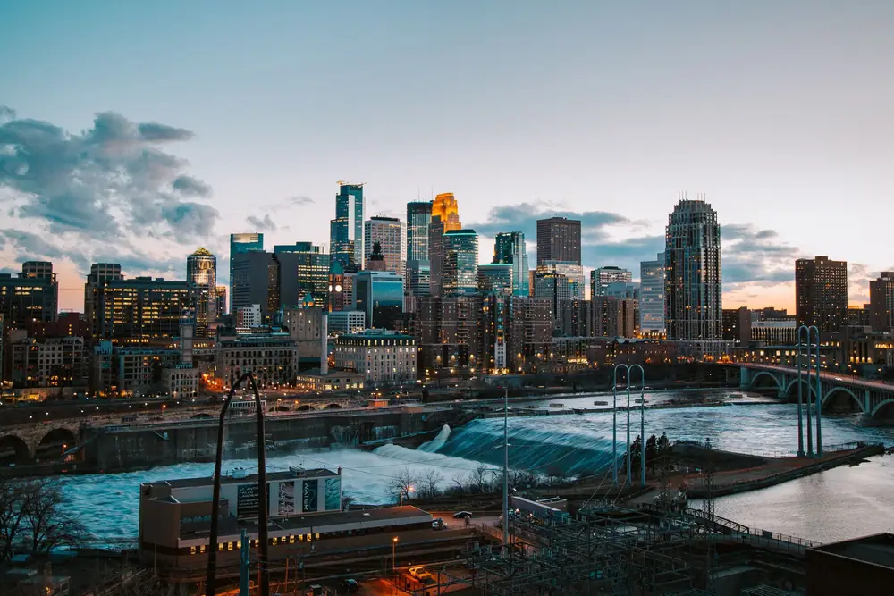 Downtown Minneapolis and the Mississippi at dusk, seen through a range of tint shades